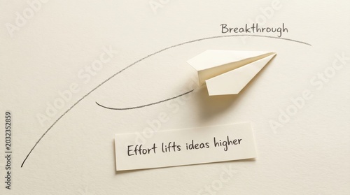 Paper plane reaching for breakthrough