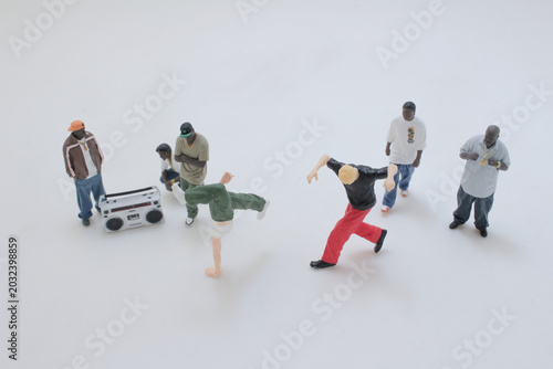 Quadro em tela Miniature street dance scene with music player