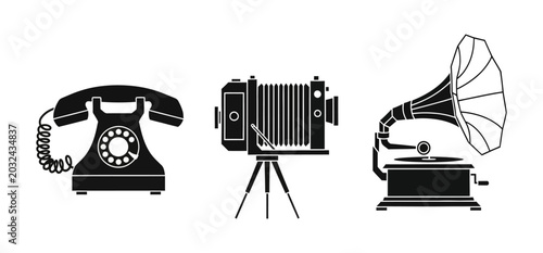 Schilderij op canvas Collection of vintage communication and entertainment devices including a rotary