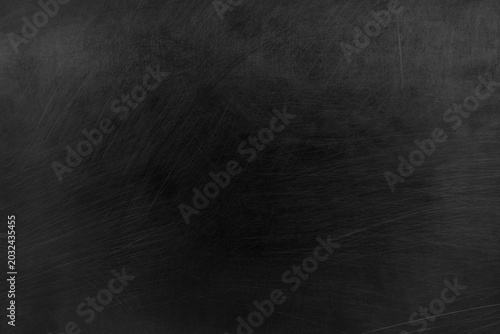 Photos Dark scratched metal texture background