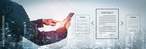 Quadro su tela A businessman interacts with a smartphone to digitally sign a contract