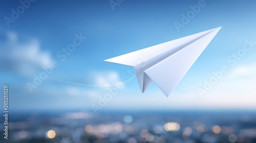 White paper plane flying over blurred city skyline at sunset concept for success business growth and innovation strategy