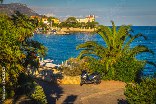 Beaulieu sur Mer resort and small harbor at sunset, France