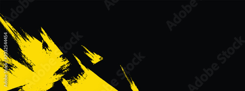 Tableau sur toile Abstract yellow brush stroke texture on black background