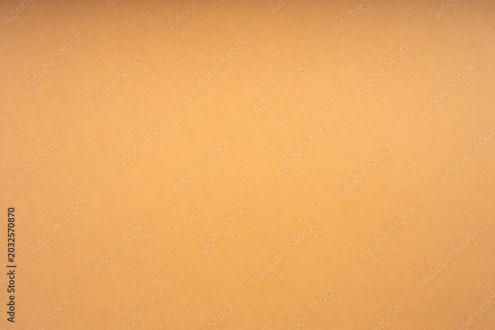 Fototapeta premium Paper texture overlay on solid orange background, minimalist surface design