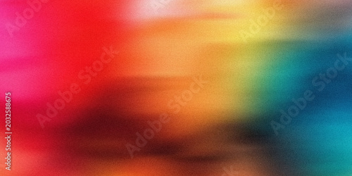Vivid rainbow spectrum blending across textured surface with warm orange center and cool blue edges representing energy flow.