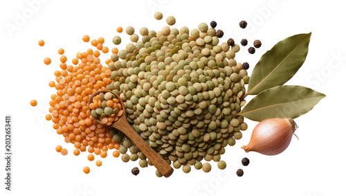 Red and green lentils with onion bay leaves, peppercorns and wooden spoon
