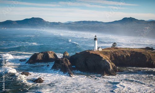 Aerial view of the natural scenery along the coastline of Cape Aquinas Lighthouse, Oregon, USA.