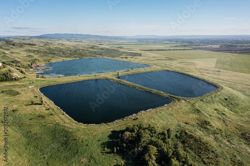Fotografie Southern Urals, phosphogypsum dumps and settling basins of the Meleuz mineral fertilizers plant