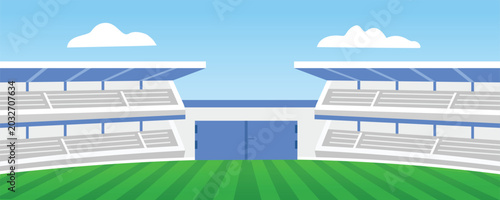 Bild auf Leinwand Empty sports stadium with green field and blue sky