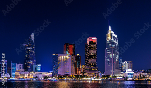 Foto Night view of coastline with skyscrapers of Ho chi minh or Saigon city in Vietna