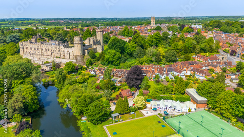 Aerial view of the town of Warwick in Warwickshire, UK with the popular castle, cathedral and racecourse on a Spring day