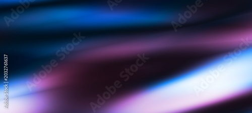 Dark blue digital abstract background with ultraviolet neon glow, blurry light lines, waves