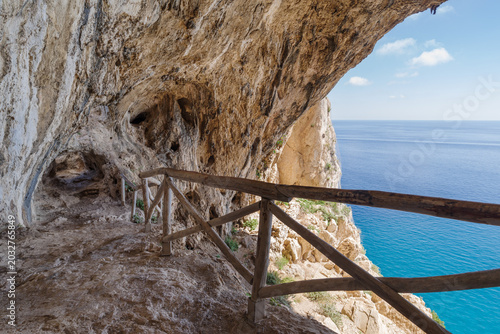 Tableau sur toile Scenic view of sea seen through cave, Grotta dei Falsari, Noli, Liguria, Italy