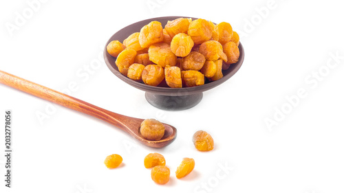 Dried Scallops in Bowl with Wooden Spoon