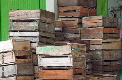 Large stacks of empty wooden transport crates