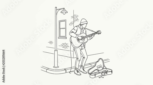 A street musician playing an acoustic guitar on a city sidewalk.