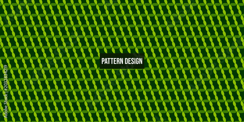 Green pattern design with repeating shapes and dark background texture
