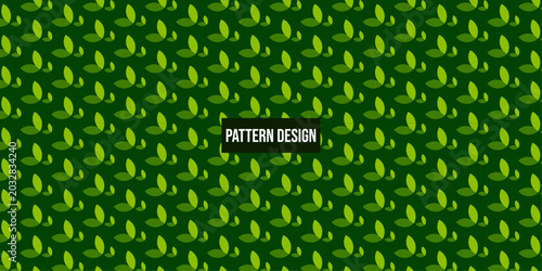 Green leaf pattern design with repeating shapes on dark background