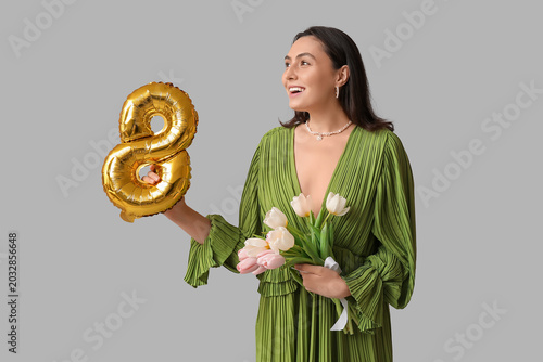 Beautiful young woman with ...