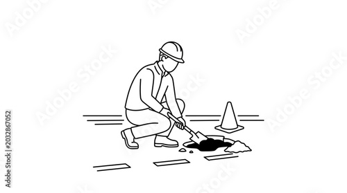 Принти на полотні A construction worker repairing a pothole on the road with a shovel