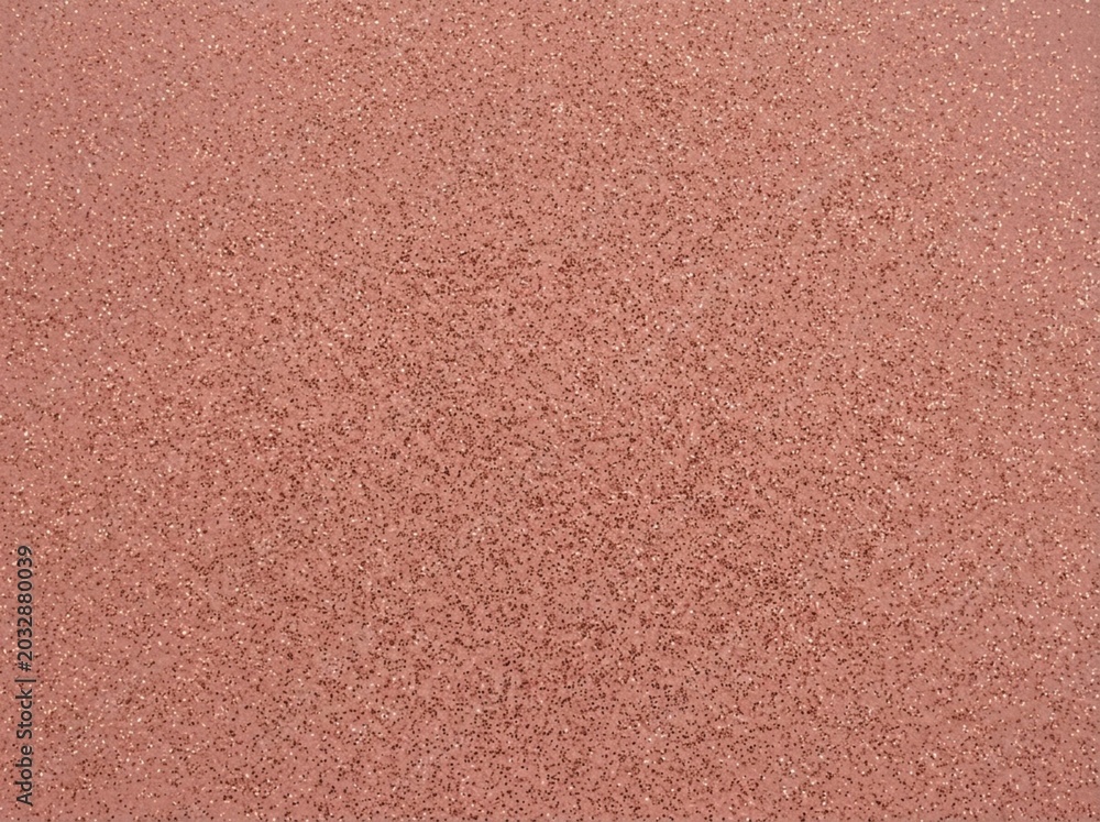 Fototapeta premium Close-up of sparkling rose gold glitter texture background