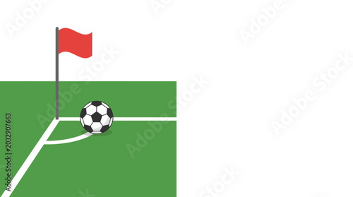 A soccer ball placed on the corner kick spot of a green field with a red flag.