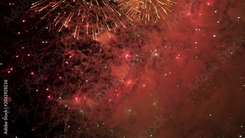 Fotografie Bright Fireworks Merge With Fog To Create Stunning Visual Effects