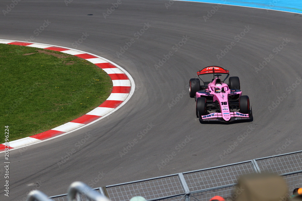 Obraz premium May 22, 2026, Montreal, Canada, F1 Academy car races through Circuit Gilles Villeneuve during Grand Prix weekend. g.