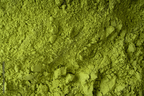 Matcha tea, matcha powder as a background.