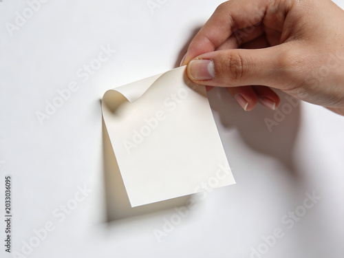 hand holding blank paper