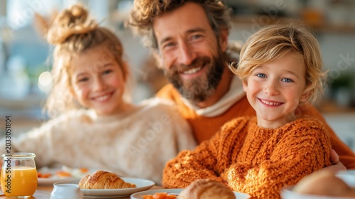 A cheerful breakfast scene featuring a father with his two children, enjoying pastries and juice together in a bright and inviting kitchen environment.