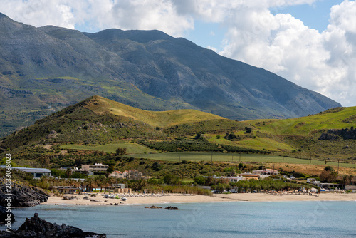 Summer landscape on Crete island with blue water and mountains