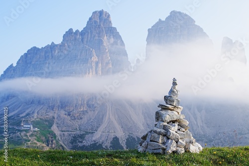 Photography Stone Cairn on Alpine Ridge with Tre Cime Peaks