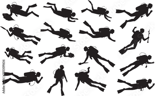 Fotografia Scuba divers in various swimming poses