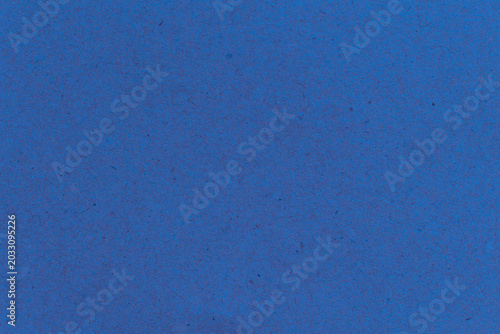 blue paper background texture light rough textured spotted blank copy space background in blue