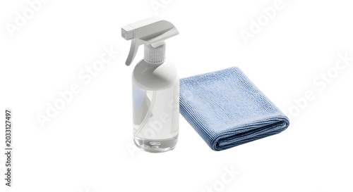 Spray bottle and folded blue cloth on surface