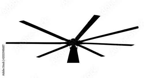 Φωτογραφία A black silhouette of a helicopter rotor spinning rapidly outdoors in clear weat