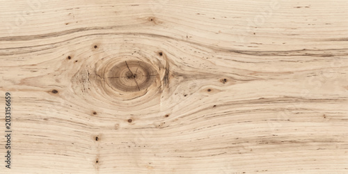 Obraz na płótnie Close-up of a natural wood texture with visible grain and knot detail, showcasing organic patterns and a warm, earthy tone