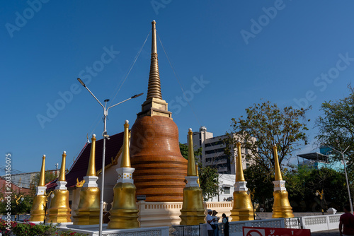 Schilderij op canvas Large chedi at Wat Mongkol Nimit in Phuket Town, Thailand