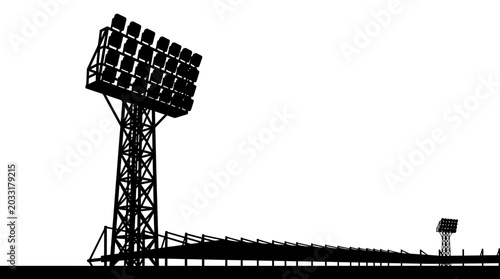 Obraz na płótnie Silhouette of a large stadium floodlight tower against a clear sky