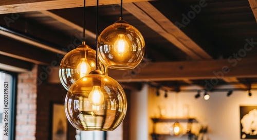 A warm close-up of amber glass pendant lights hanging from a rustic wooden ceiling in a cozy cafe setting, casting a soft golden glow, restaurant, shop, dim