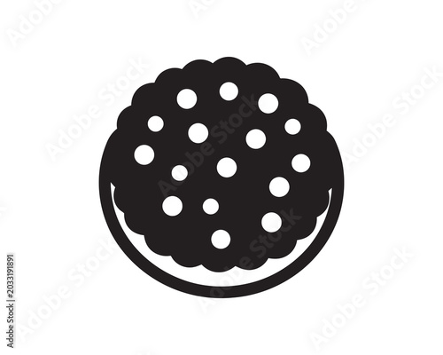 Black silhouette of a cookie with holes