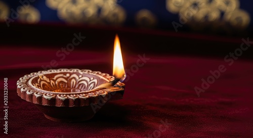 Traditional clay diya lamps with glowing flames lit for Diwali celebration on a decorative background for Hindu pooja and festive rituals, celebration, puja, orange