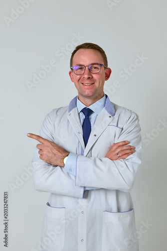 a doctor in a white coat on a white background
