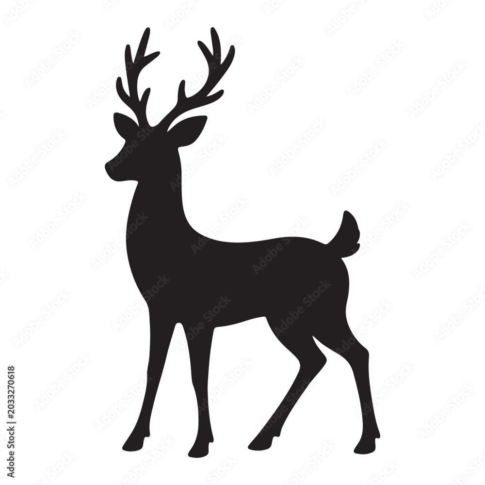 Fototapeta premium Reindeer Silhouette: A striking silhouette of a reindeer with impressive antlers stands majestically, a symbol of winter wilderness and holiday spirit.