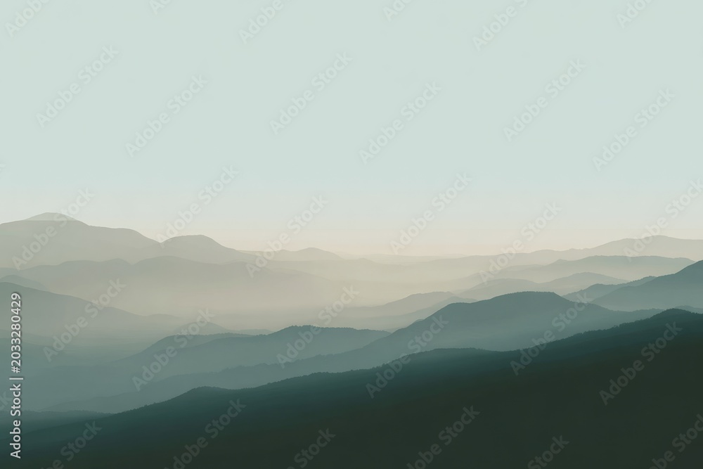 Naklejka premium Serene layers of misty mountains at dawn