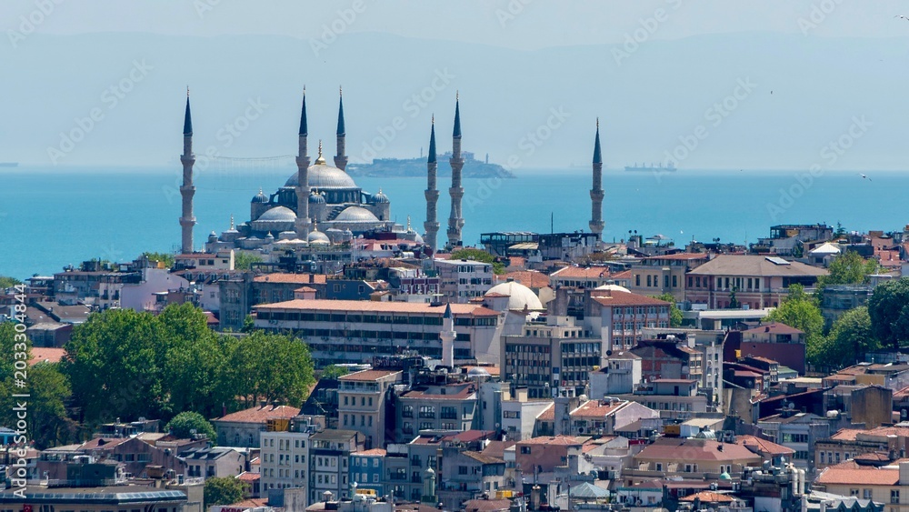 Fototapeta premium Istanbul, Turkey - May 19, 2026: Panoramic view of Istanbul, Turkey, showing the city skyline, buildings, urban neighborhoods, rooftops, and scenic cityscape.