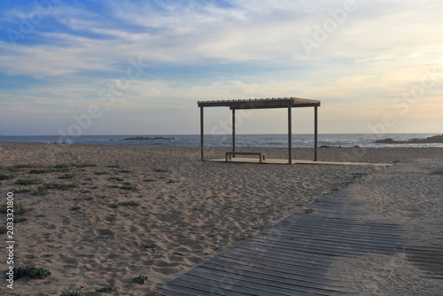 A wooden dock on a beach