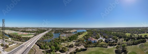 Foto Aerial park scene with dam, walkway, hiking trail, pond, hydroelectricity, etc